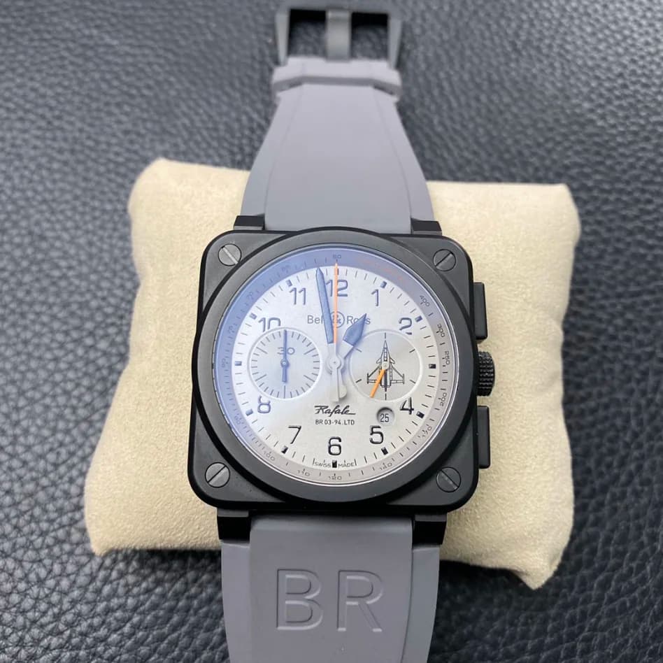 Bell & Ross BR 03-94 Replica — Pale dial / dark case. Pale dial, two subdials, dark square case, crown-side pushers and grey strap.